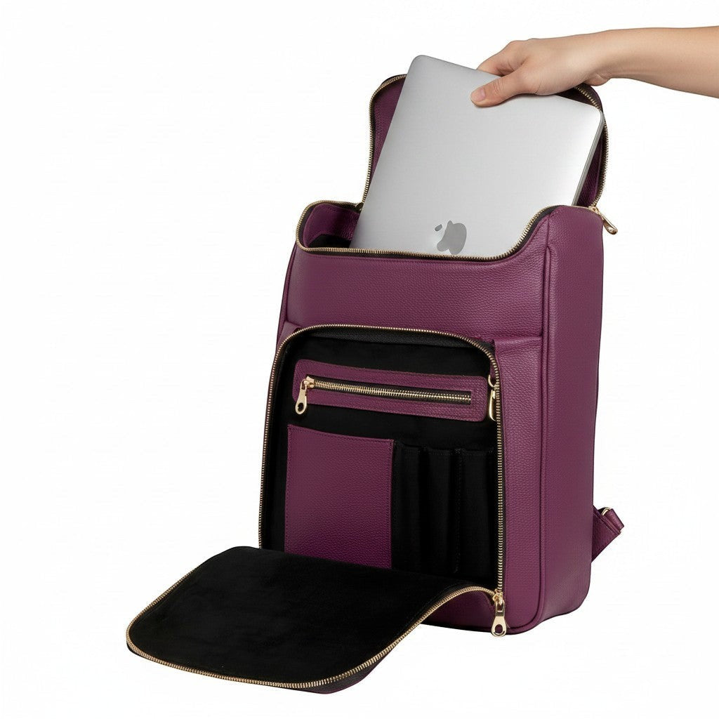 Luis Steven burgundy pebble leather laptop backpack with gold hardware and multiple organizer pockets.