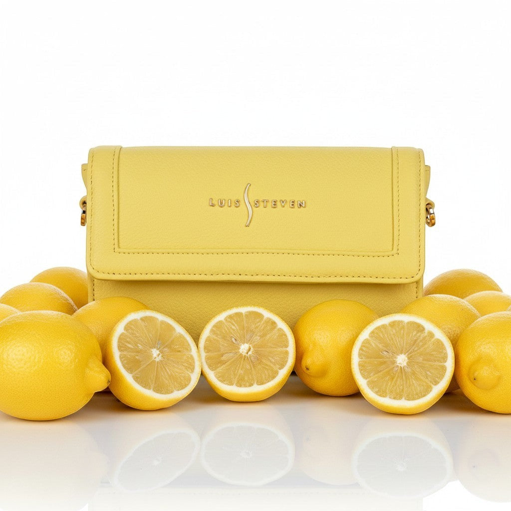 Luis Steven lime pebble leather Charley crossbody bag with gold hardware and magnetic flap closure.