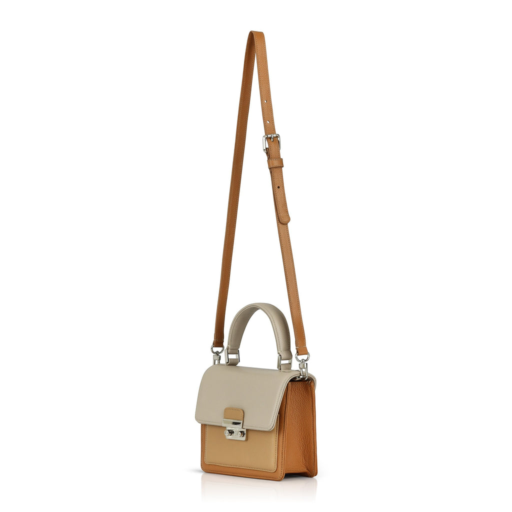 Luis Steven Madie small top handle bag in tan and cream pebble leather with a detachable crossbody strap