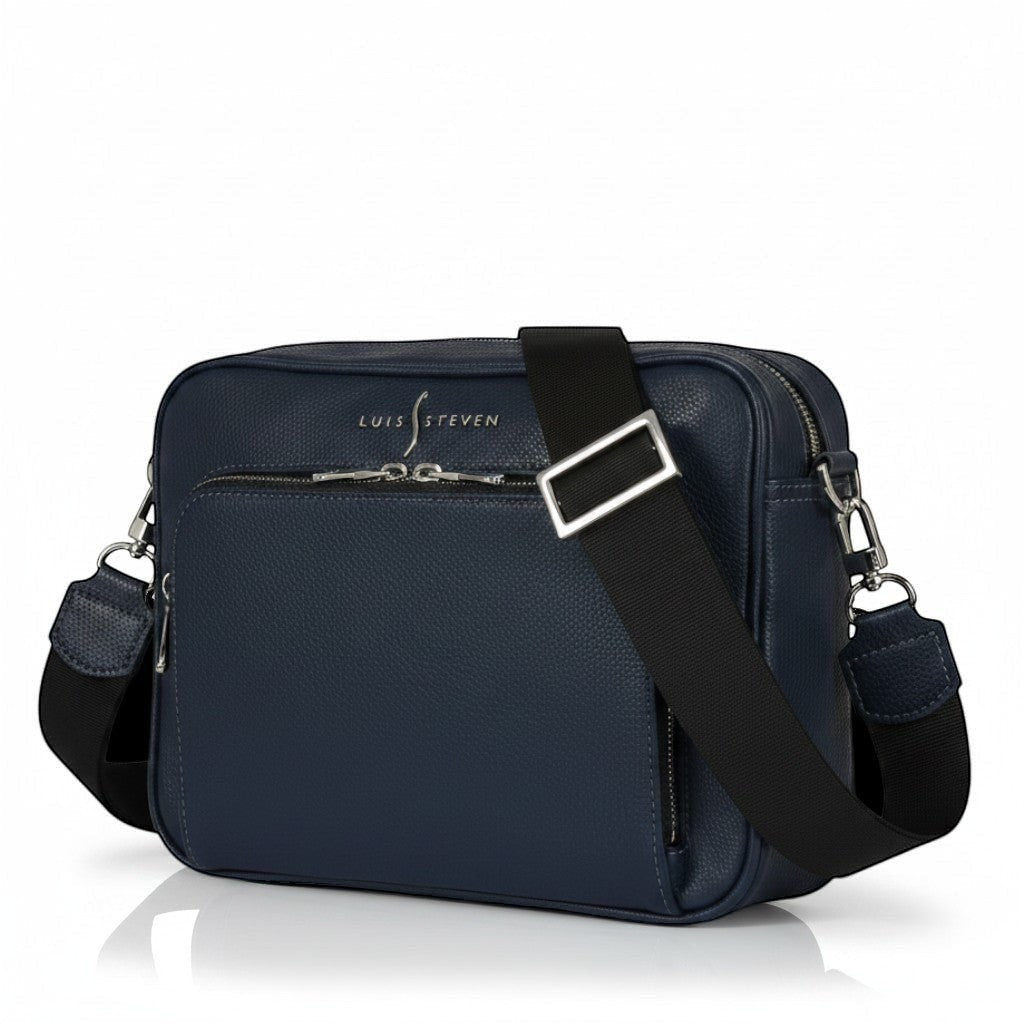 Luis Steven West Side Messenger bag in midnight blue pebble leather with black crossbody strap and silver hardware.
