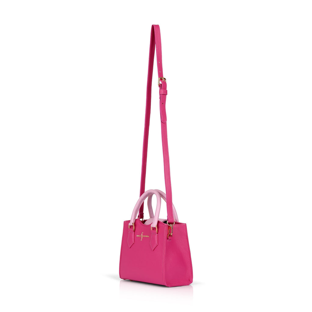 Luis Steven pink pebble leather mini tote bag with top handles and detachable crossbody strap. Interior zipper pocket.