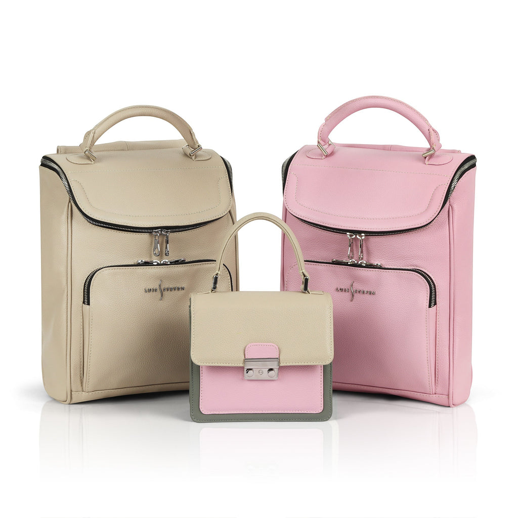 Luis Steven pink pebble leather small laptop backpack with top handle and front zipper pocket.