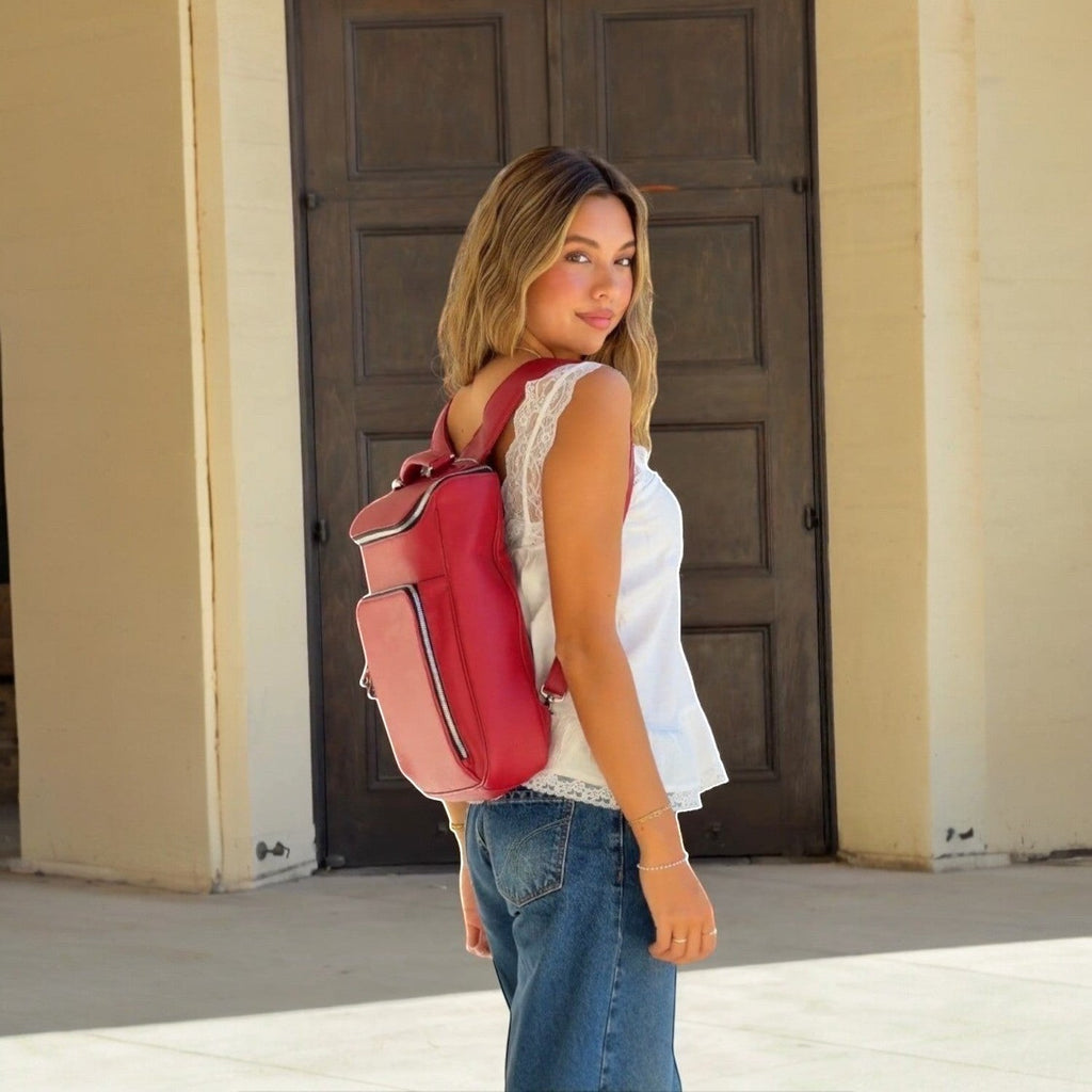 Luis Steven red pebble leather laptop backpack with concealable straps and multiple pockets, fits up to 14.5" laptops.