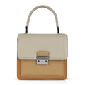 Luis Steven Madie small top handle bag in tan and cream pebble leather with nickel hardware and a secure lock closure.