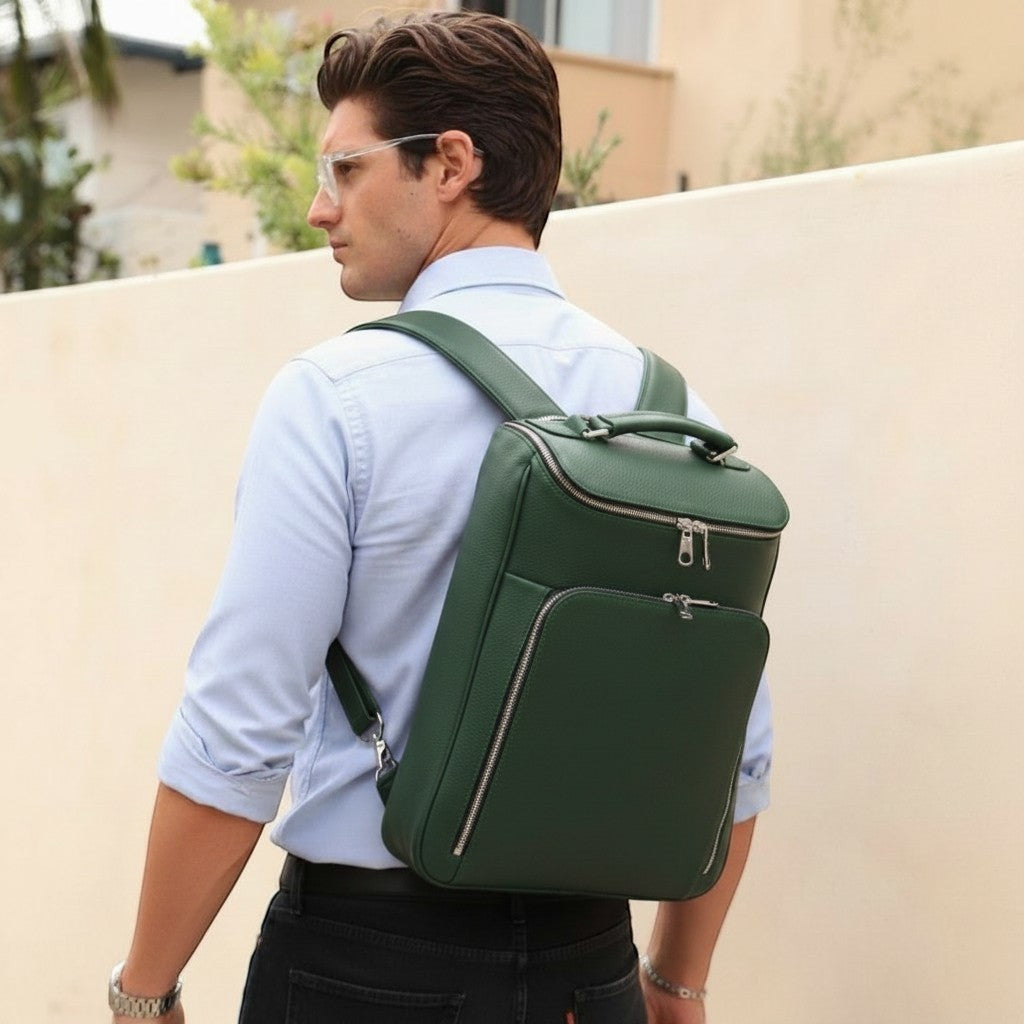 Luis Steven tan pebble leather laptop backpack with briefcase style, top handle, and concealable straps.