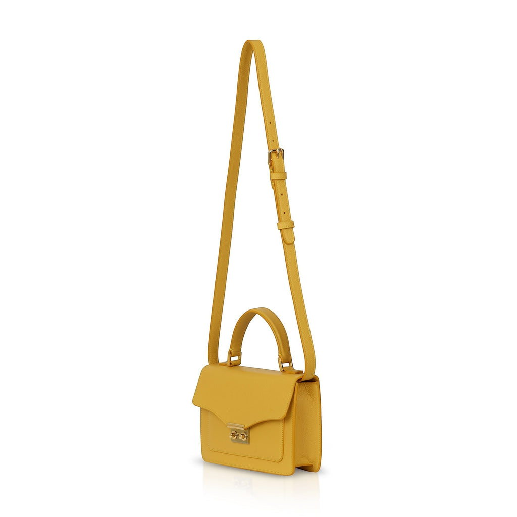 Luis Steven yellow pebble leather top handle purse with removable crossbody strap and gold lock closure.
