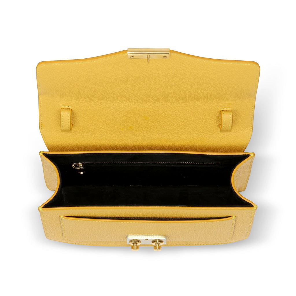 Luis Steven yellow pebble leather top handle purse with gold hardware and lock closure. Interior features suede lining and a zip pocket.